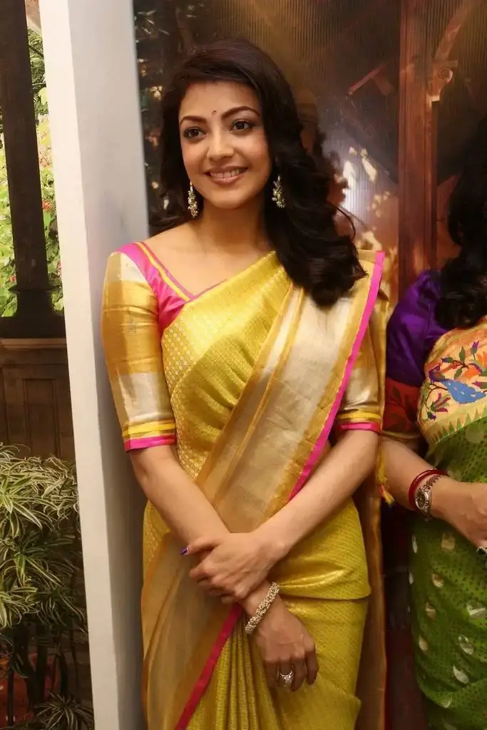 Kajal Aggarwal In Yellow Saree At Designer Store Launch